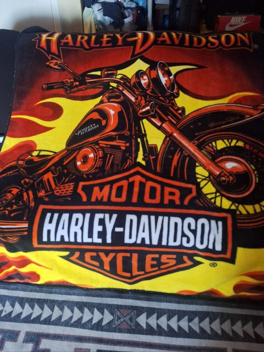 Harley Davidson Blanket in black and orange is a cozy and stylish addition.